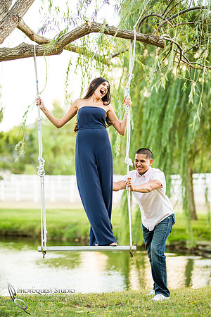 Fun time on the swing engagement photo by Wedding Photographer