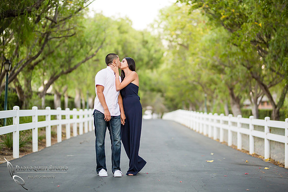 Kissing him at sunset by Temecula Wedding Photographer
