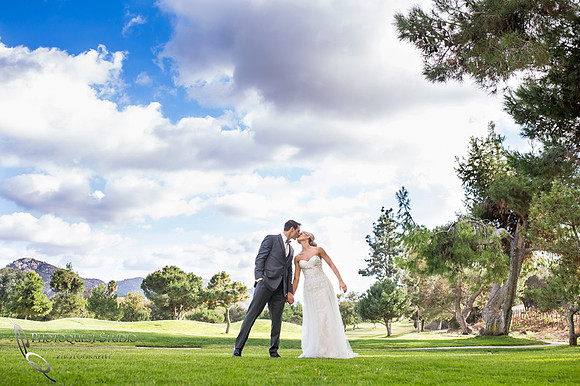 Lovely kiss at Fallbrook, San Diego wedding by temecula photographer