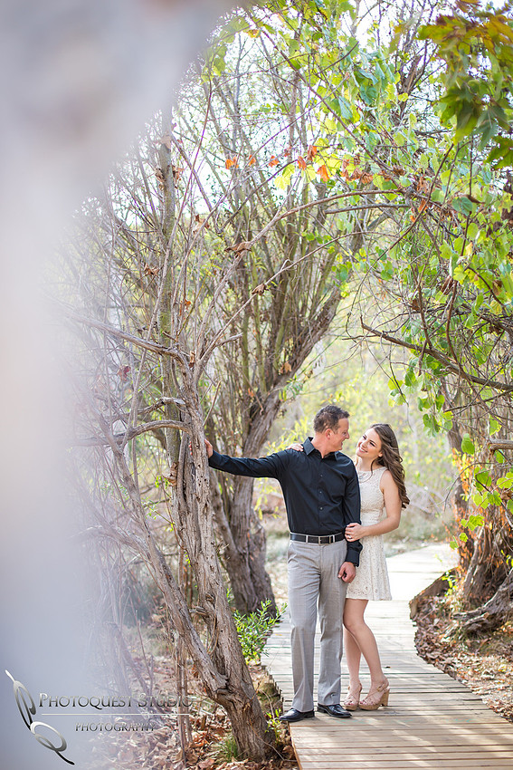 the looks of love, Kissing couple at the park, Southern California Engagement with nature in fall Photos in Fallbrook, San Diego by Temecula Winery Wedding Photographer, Sarah & Shawn