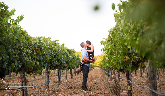 Kissing at South-Coast-Winery, Surprise-Proposal-Photo-in-Temecula