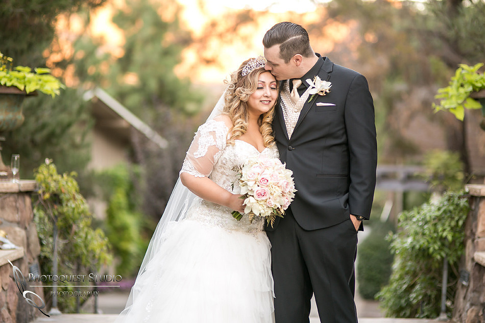 Kissing her by Fallbrook, Temecula Wedding Photographer