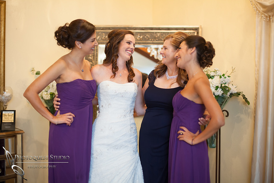 bride, bridesmaid and mom at Falkner winery wine wedding by temecula wedding photographer