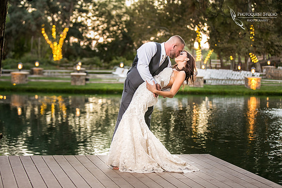 Kissing by the Dock, Wedding photo at Temecula Winery Lake Oak Meadows by photographer of Photoquest Studio