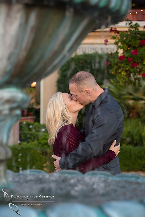 The kiss at Engagement photo at South Coast Winery, California by Temecula Wedding Photographers