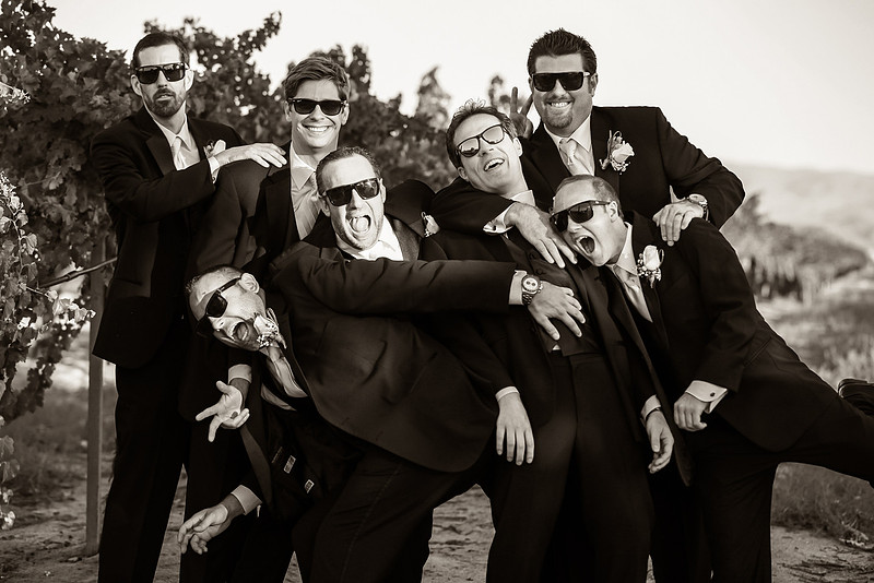 The handsome groomsmen and the Groom having fun at Ponte Winery Wedding, Temecula Winery Wedding Photography by Temecula Wedding Photographers of Photoquest Studio, Photography