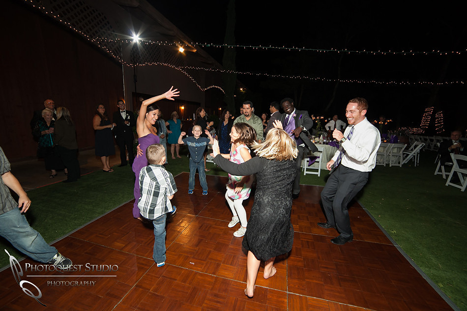 party and dancing at wedding reception by Falkner winery wine wedding by temecula wedding photographer