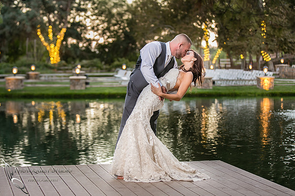 Kissing Wedding photo at Lake Oak Meadows, Temecula Winery by Photographer of Photoquest Studio