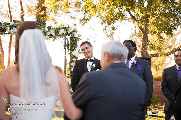 bride enter wedding ceremony at Falkner winery wine wedding by temecula wedding photographer