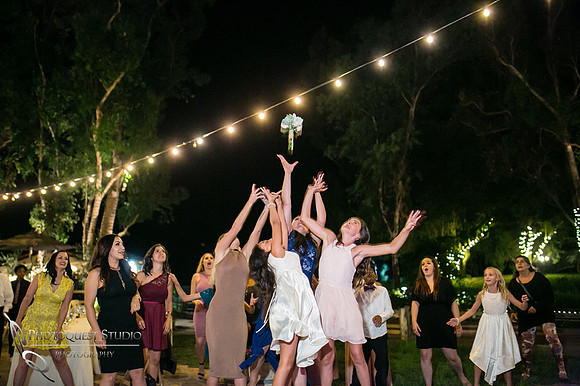 Wedding bouquet catch at Lake Oak Meadows, Temecula Winery by Photographer of Photoquest Studio