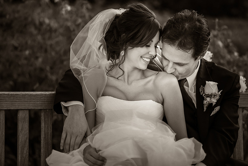 The Groom kissing his beautiful bride's shoulder at Ponte Winery Wedding, Temecula Winery Wedding Photography by Temecula Wedding Photographers of Photoquest Studio, Photography